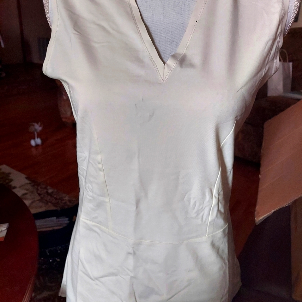 Ladies sleeveless leather edge stitching top